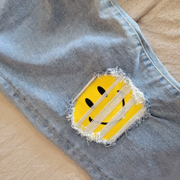 Guess X Chinatown Market Jeans with Yellow Smiley Knees